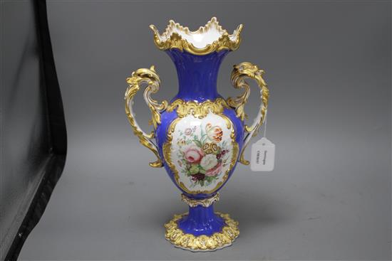 A Victorian porcelain vase, painted with panels of garden flowers, height 35cm